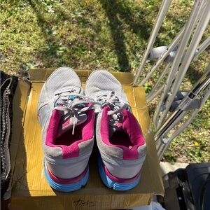 Nike Women's Gray Running Sneakers with Pink Lining and Blue Outsole